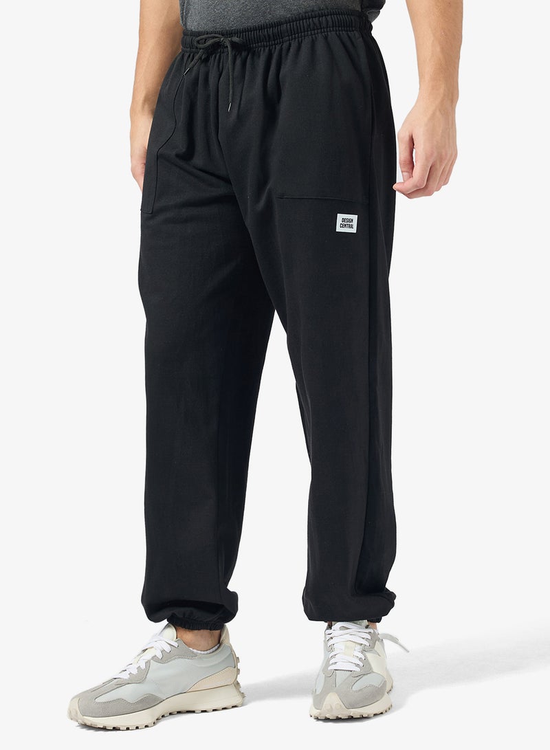 سفنتي فايف بيسيكس بنطلون رياضي مريح بقصة فضفاضة - Image 1