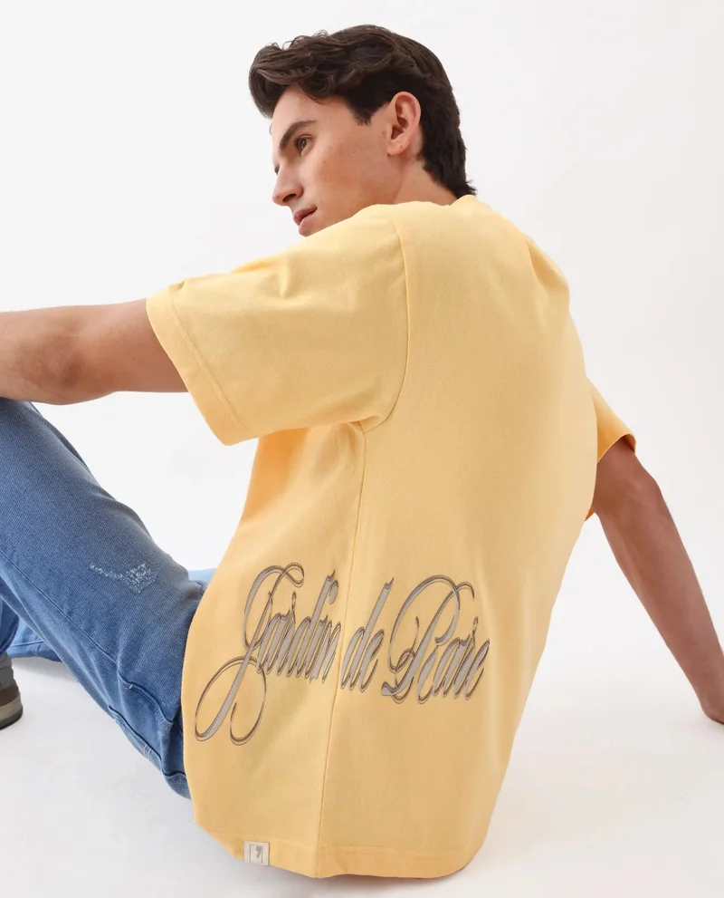 Rare Rabbit Rare Rabbit Men Siwa Light Yellow Cotton Fabric Short Sleeve Slip-On Oversized Fit Graphic Print T-Shirt