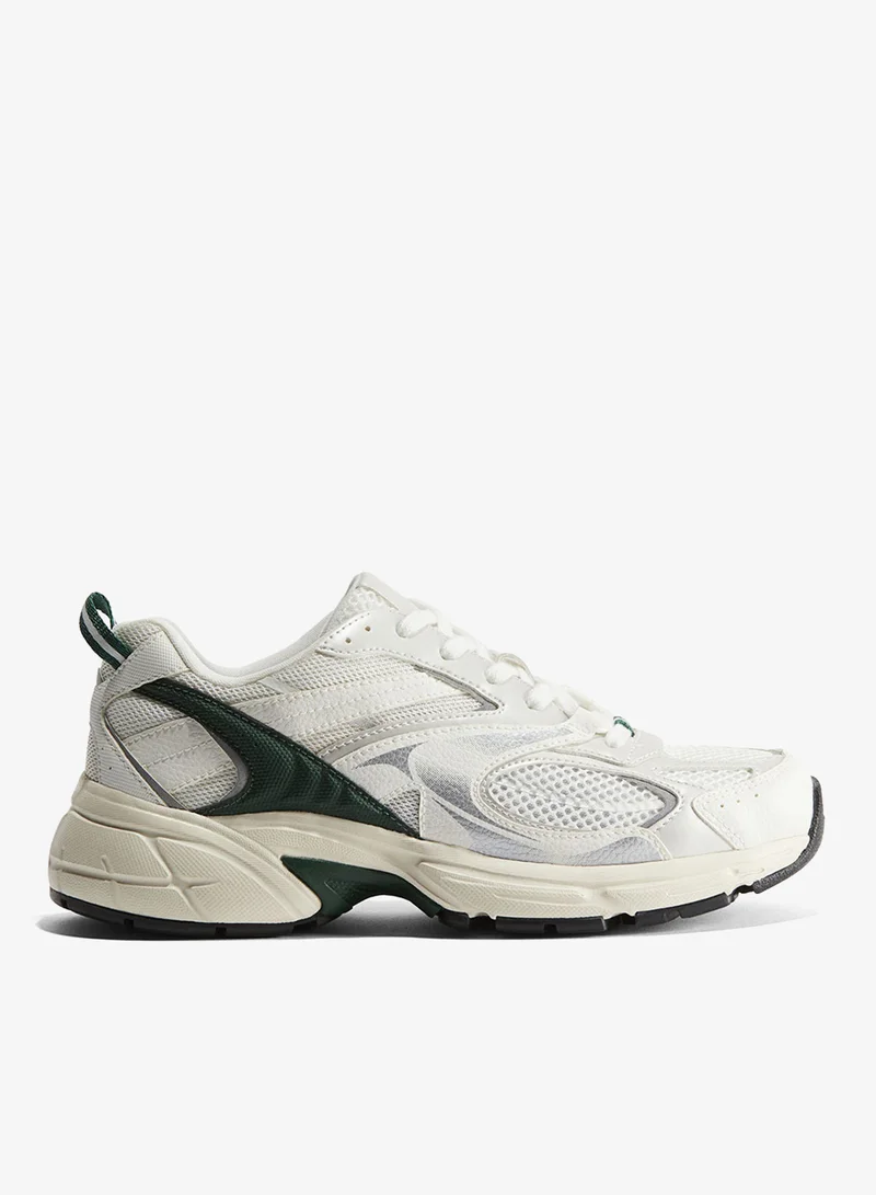 اتش اند ام حذاء رياضي بتصميم مكتنز