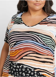 Striped Asymmetrical Hem Top - pzsku/ZC9619807EC36652F1A60Z/45/_/1698932150/c87a1982-97a8-46ff-8972-8503d8db933d