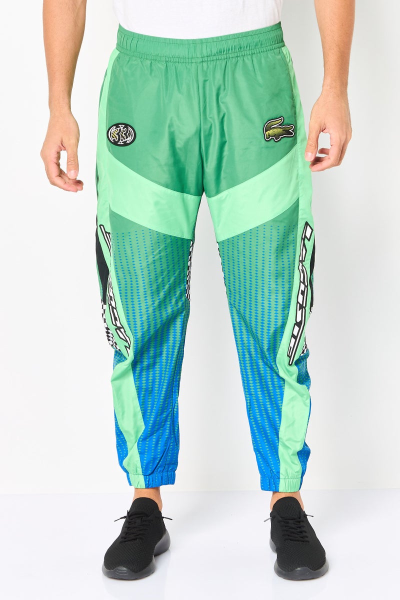 LACOSTE Men Regular Fit Graphic Print Track Pants, Green - Image 1