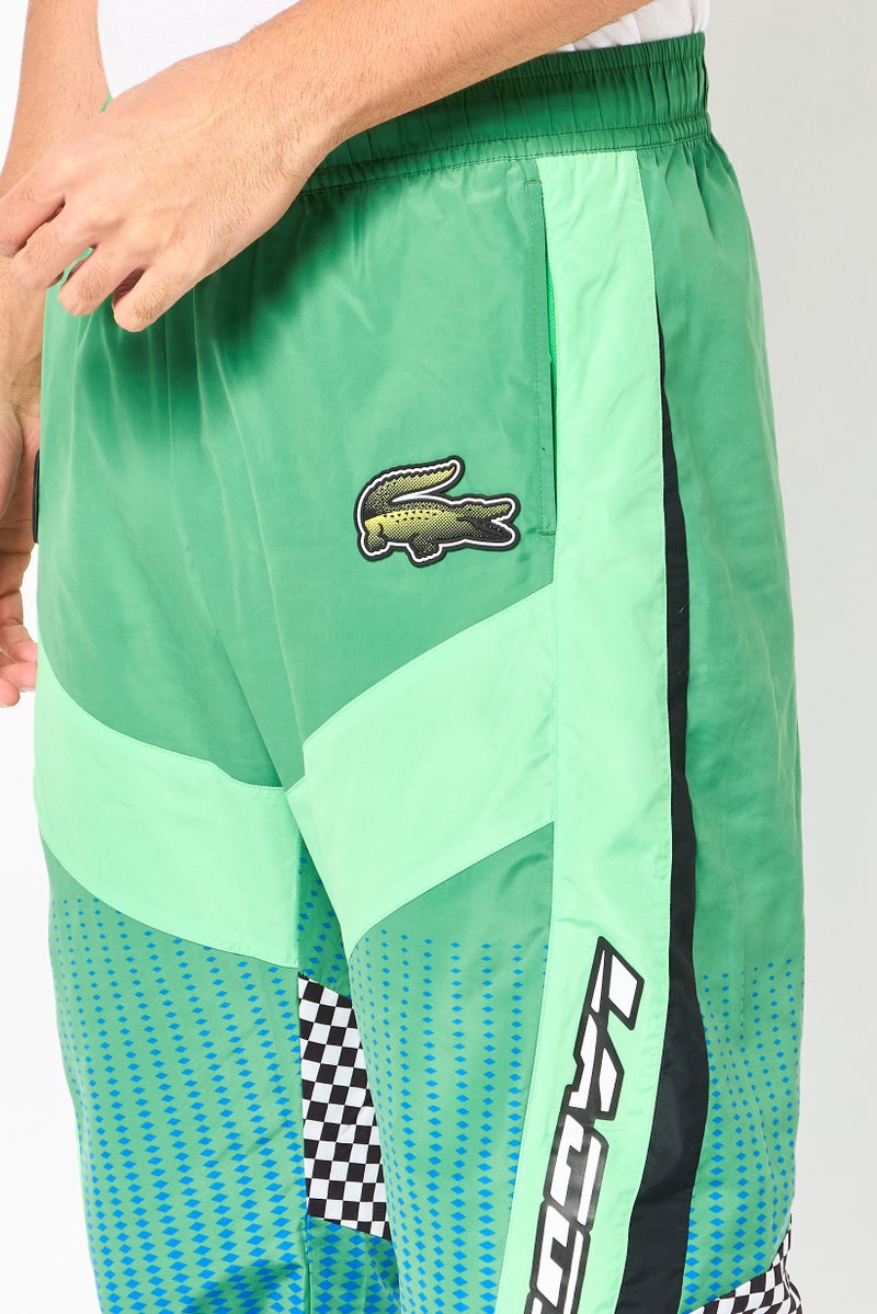 LACOSTE Men Regular Fit Graphic Print Track Pants, Green - Image 3
