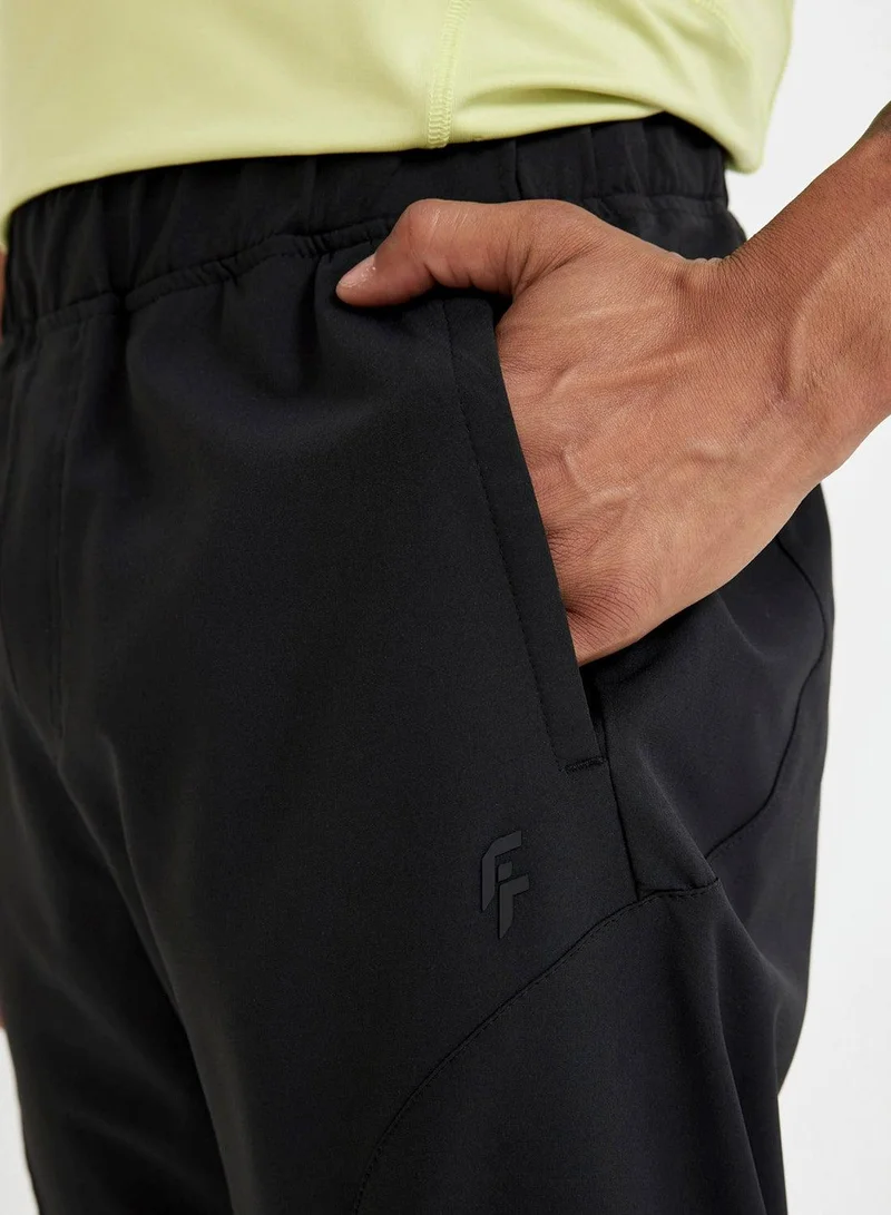 DeFacto  Defactofit Slim Fit Double Pocket Zippered Jogger Sweatpants for Men | Best Price UAE