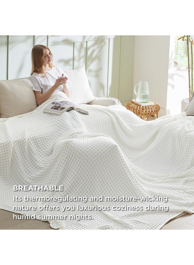 Bedsure Bedsure Cooling Cotton Waffle Oversized King Blanket - Lightweight Breathable Blankets Rayon Derived from Bamboo for Hot Sleepers, Luxury Throws for Bed and Sofa, Ivory, 120x96 Inches  - Image 4