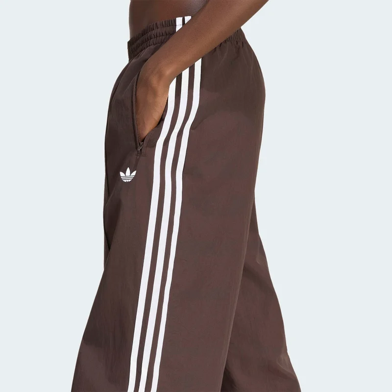 Adidas Originals  FLORAL GFX FIREBIRD LOOSE TRACK PANT for Women | Best Price UAE