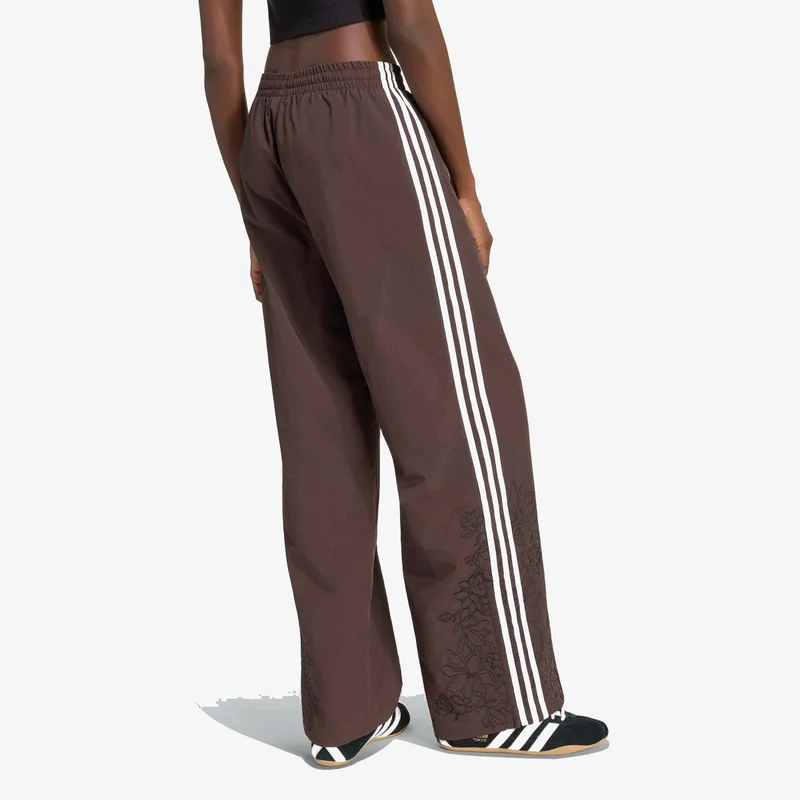 Adidas Originals  FLORAL GFX FIREBIRD LOOSE TRACK PANT for Women | Best Price UAE