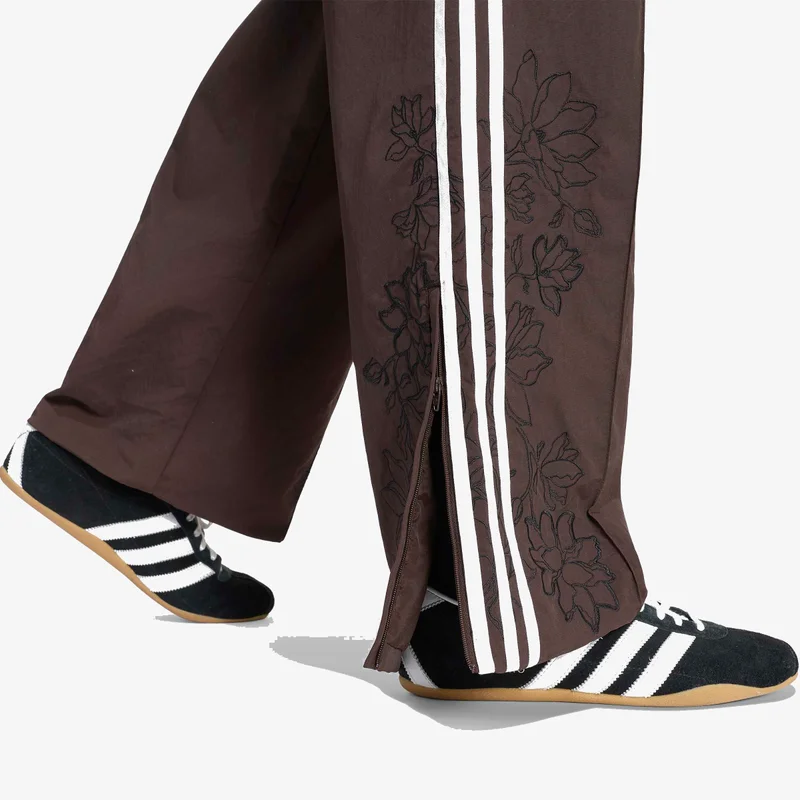 Adidas Originals  FLORAL GFX FIREBIRD LOOSE TRACK PANT for Women | Best Price UAE