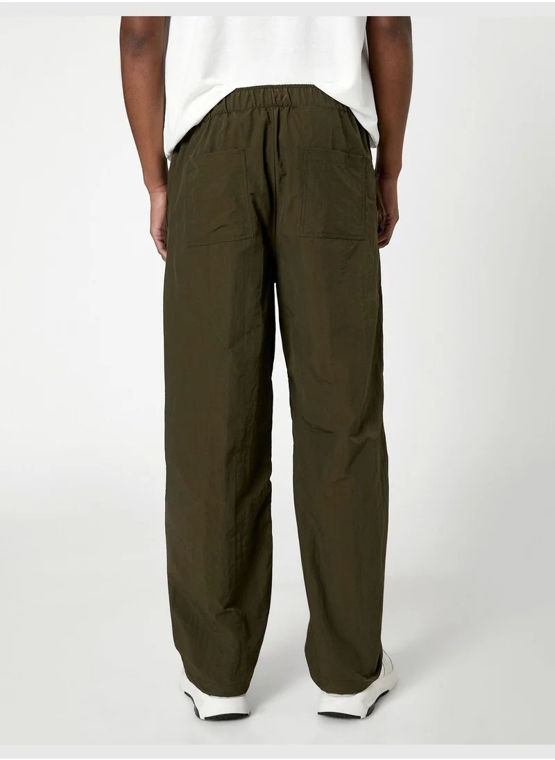 كوتون Parachute Trousers Drawstring Elastic Leg Pocket Detailed