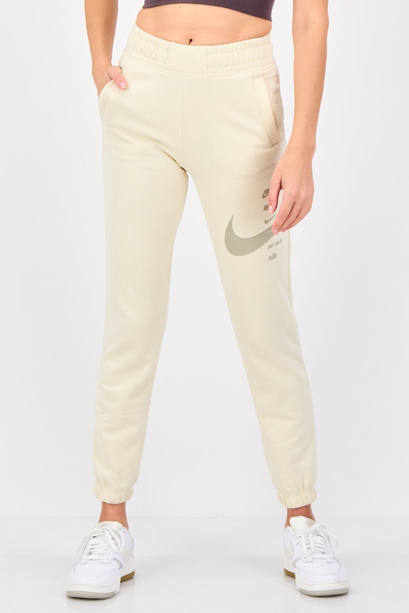 Nike سروال رياضي خارجي للنساء بتصميم قياسي، كريمي - Image 1