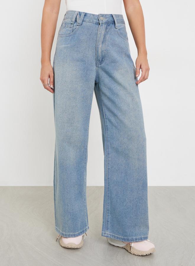 ستايلي جينز بأرجل واسعة وخصر عالي مع تفاصيل باهتة - Image 2