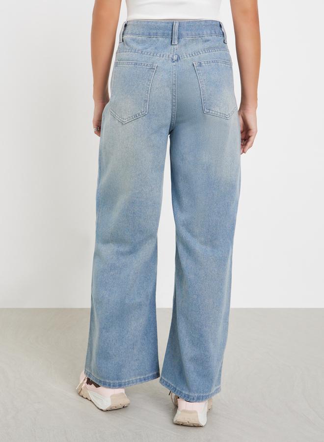 ستايلي جينز بأرجل واسعة وخصر عالي مع تفاصيل باهتة - Image 4