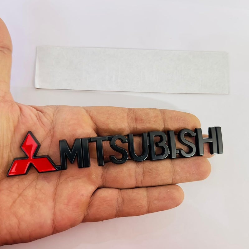 AUTO MT شعار ميتسوبيشي الأسود 15سم × 2سم شعار معدني للسيارة 3D ملصق رياضي ملصق جولة كبيرة شعار متعدد الاستخدامات - Image 1