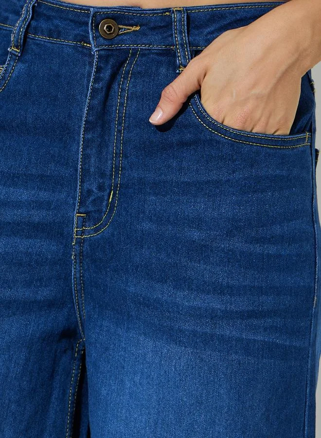 Styli  Medium Blue Mid-Rise Flared Leg Jeans for Women | Best Price UAE