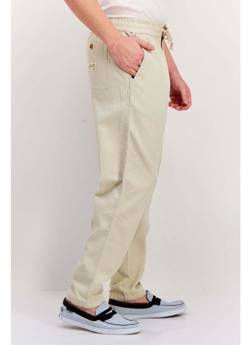 Men Regular Fit Embroidered Logo Straight Leg 14 Inseam Pants, Cream - pzsku/ZC9A10A74C67E4822E48EZ/45/_/1737642094/21e8b6df-aa38-49e5-94fc-e7db8b72f2e0