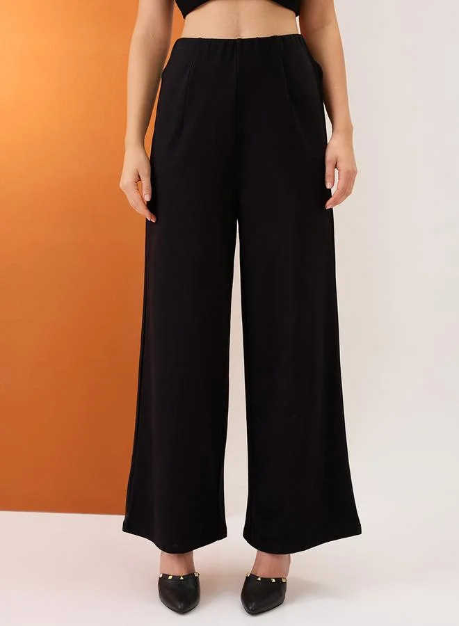 globus Black Solid Mid-Rise Wide Leg Trousers
