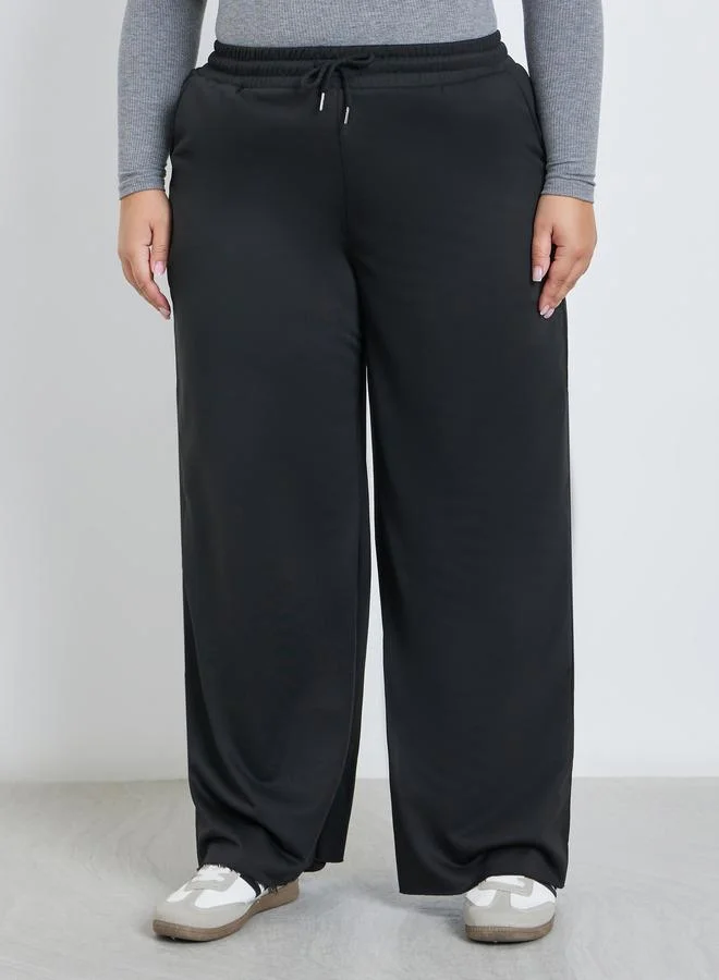Styli Styli Plus Black Wide Leg Joggers with Drawstring Waist