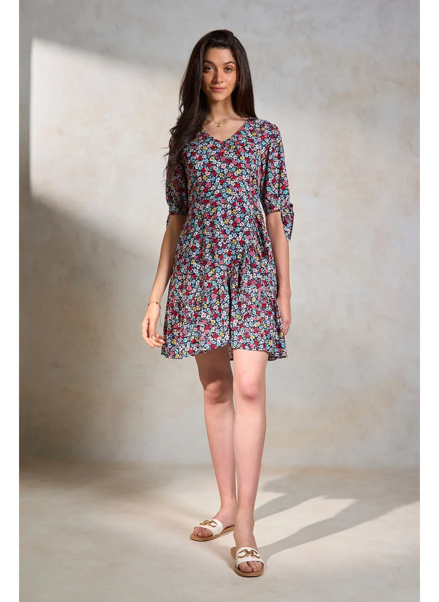 Virgio Virgio Floral Printed Puff Sleeves Tie Up Ruffled Fit & Flare Dress
