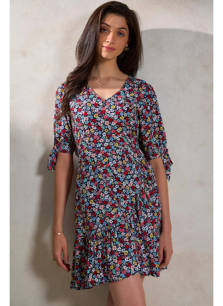 Virgio Virgio Floral Printed Puff Sleeves Tie Up Ruffled Fit & Flare Dress