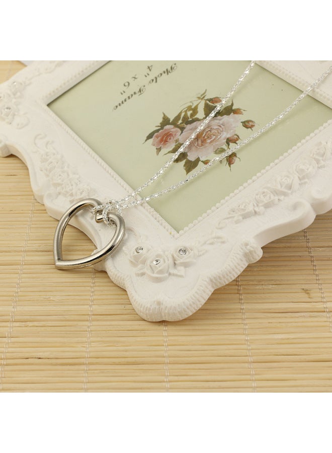 Magic Toys Tomorrow Ring Seamless Small Magic Knot Wedding Magic Ring Props Wholesale-Color:Silver Heart Necklace  - Image 1