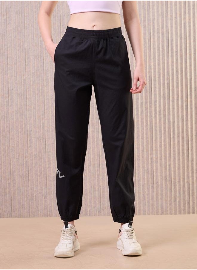 Technosport Technosport Women Black Solid 2-Way Stretch Joggers  - Image 3