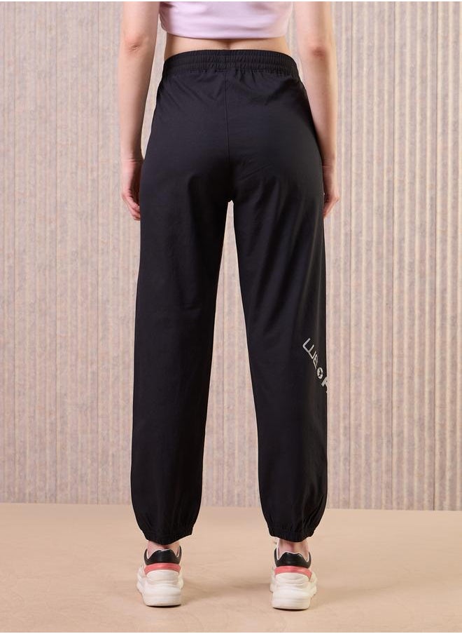 Technosport Technosport Women Black Solid 2-Way Stretch Joggers  - Image 1
