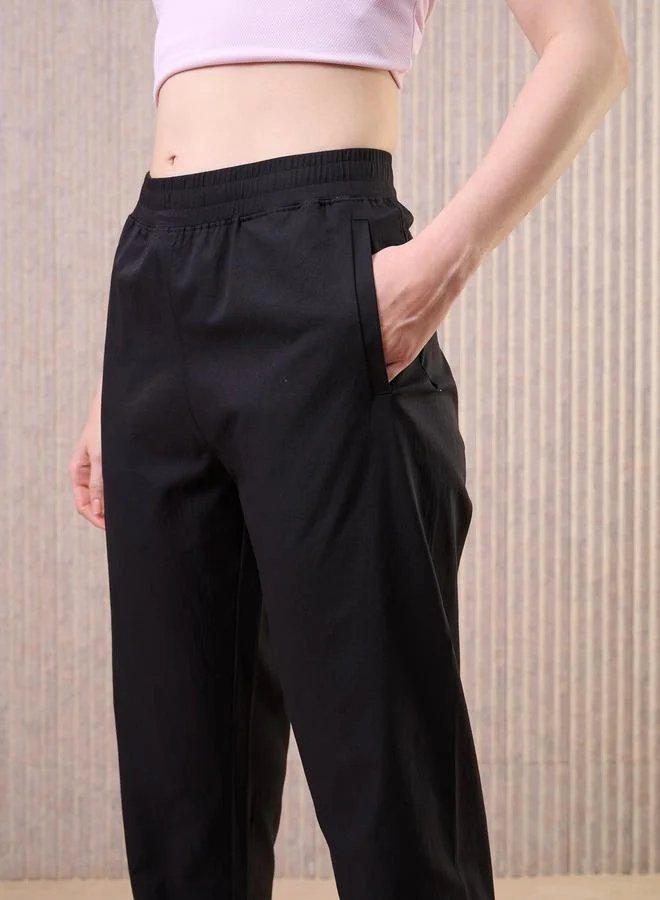 Technosport Technosport Women Black Solid 2-Way Stretch Joggers