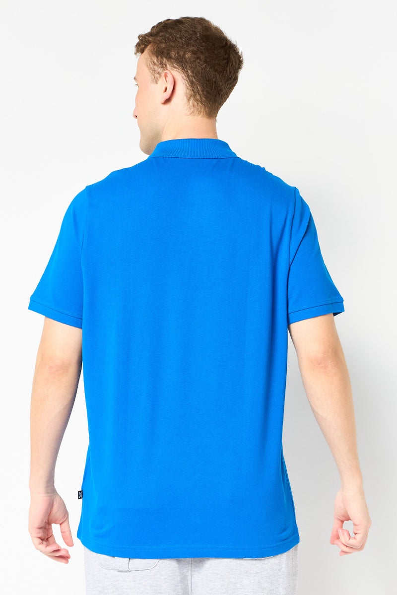 PUMA Men Sportswear Fit Short Sleeve Embroidered Logo Outdoor Polo Shirt, Blue - Image 4