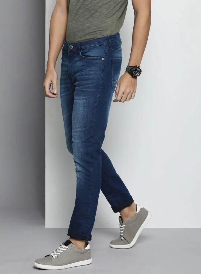 ذا انديان كراج كو Men Slim Fit Solid Mid-Rise Stretchable Jeans