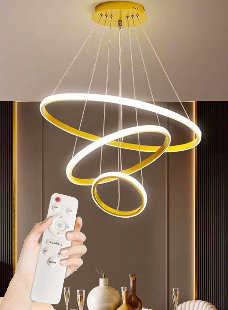 A fashionable LED pendant light with three light rings, featuring three different light colors, adjustable height, suitable for living room, dining room, living area, bedroom and corridor. - Image 1