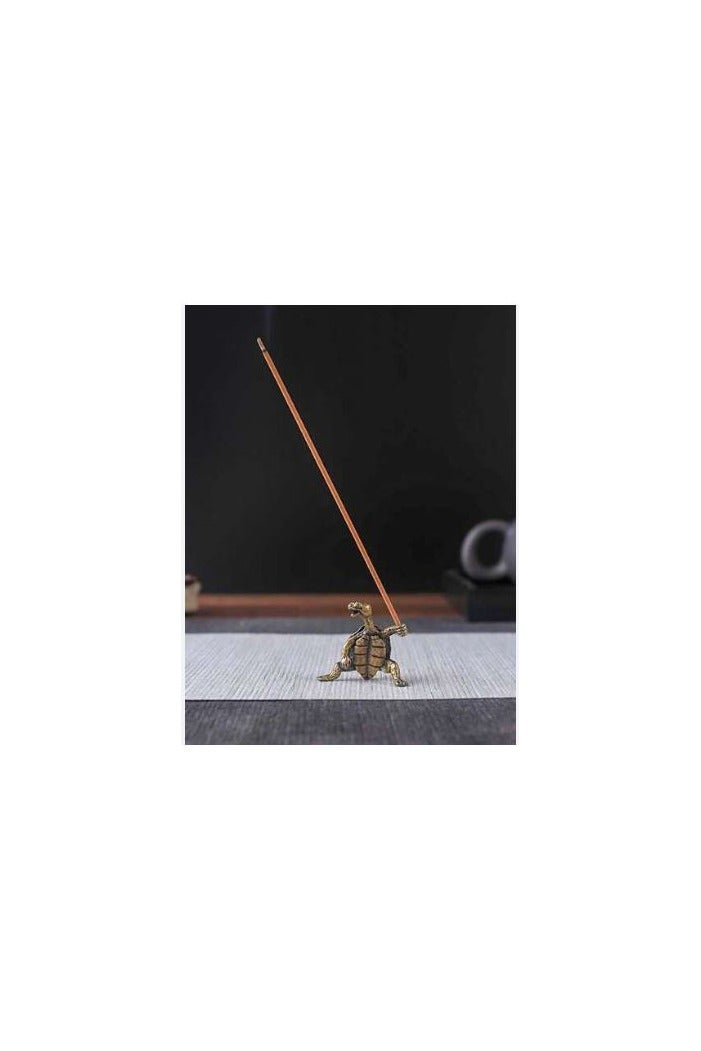 "An elegant and luxurious metal incense burner with artistic engravings.  "  - Image 3