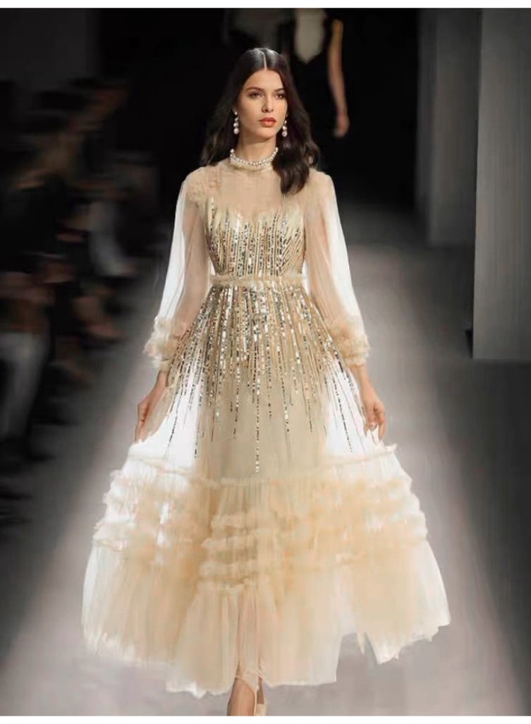 Madam Uniq Beige Tulle Gown with Sequin Embellishments and Ruffled Details - Image 1