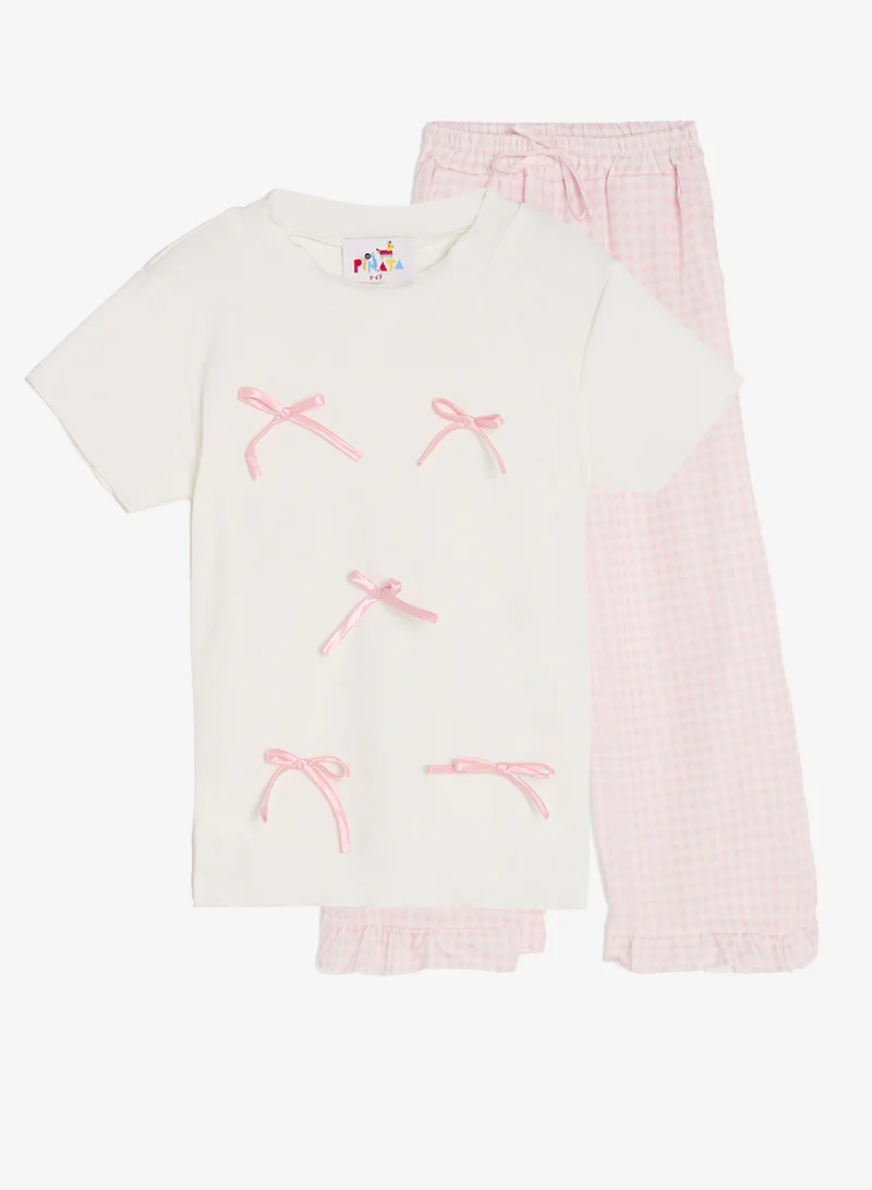 بنياتا طقم بلوزة وبنطلون