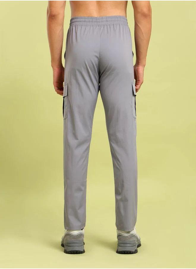 تكنوسبورت Men Solid Relaxed Fit Cargo Pants with TS FLEXI by Styli