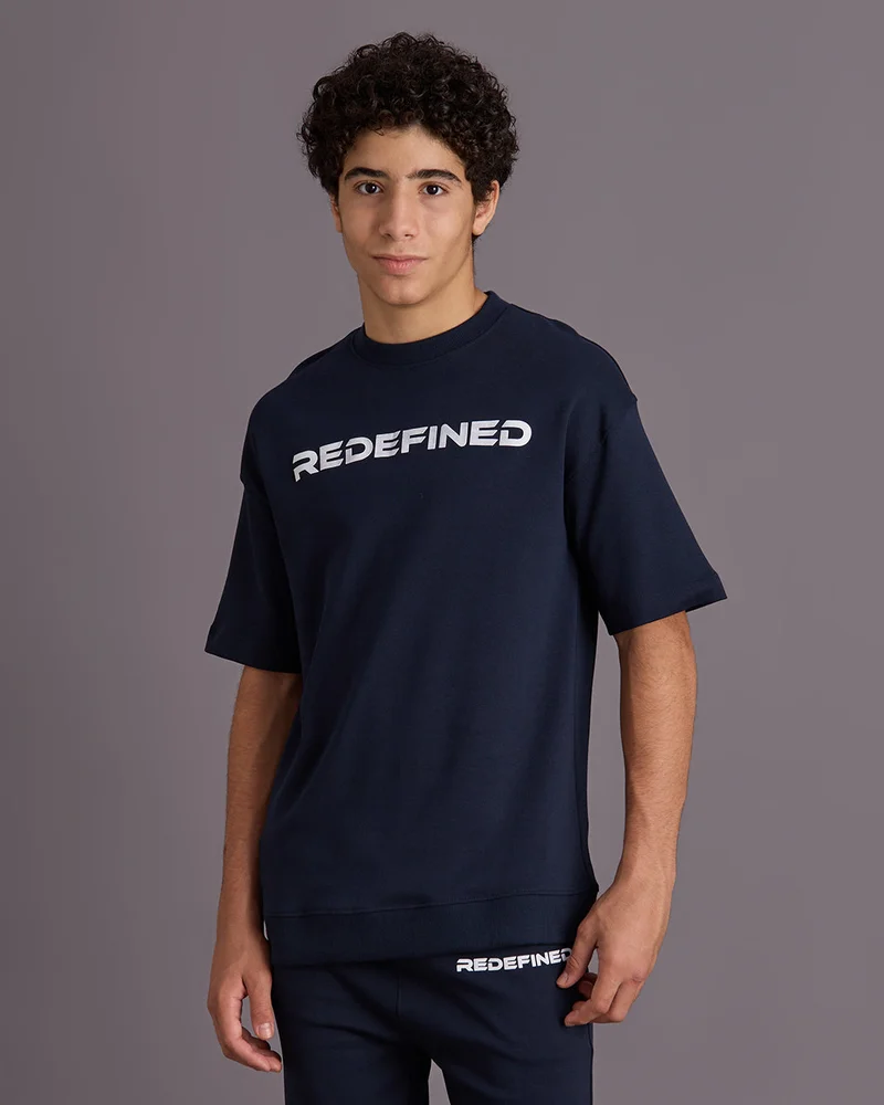 ردتاغ طقم كاجوال مطبوع باللون الكحلي للأولاد الكبار