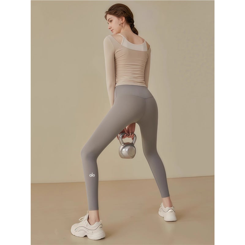 Alo Yoga High Waist Peach Butt Seamless Yoga Pants for Running and Fitness - Image 5