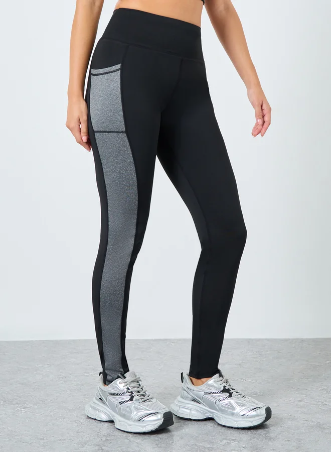 ستايلي اكتيف ليقنز بنمط كُتل الألوان مع تفاصيل جيوب