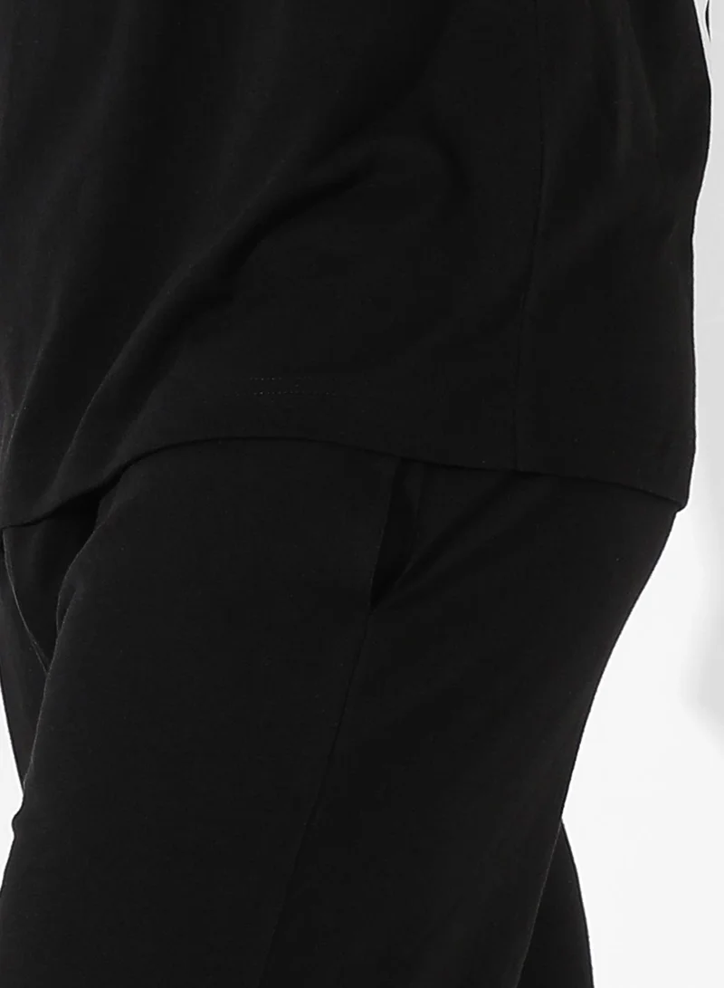 Campus Sutra Men's Black Relaxed Co-Ord Set With Graphic Print