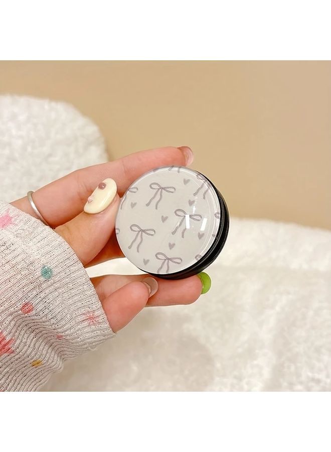 Purple Bow Tie Pattern 3D Round Phone Stand Silicone Push Pull Telescopic Folding Holder - Image 1