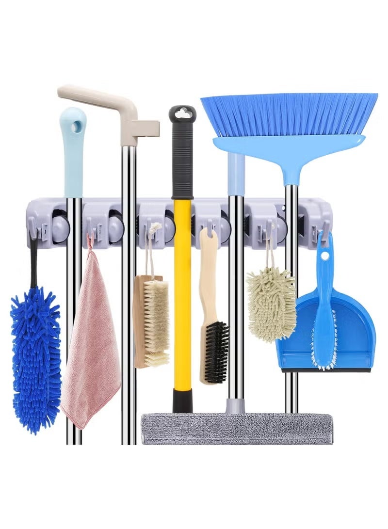 A broom and mop organizer that attaches to the wall, used to organize gardening tools and storage in the garage and laundry room with hooks, plastic, gray. - Image 1
