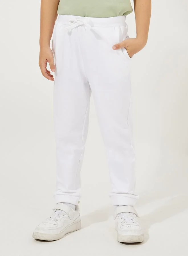 Styli Solid Round Neck T-Shirt & Full Length Pants Set