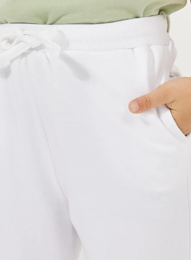 Styli Solid Round Neck T-Shirt & Full Length Pants Set