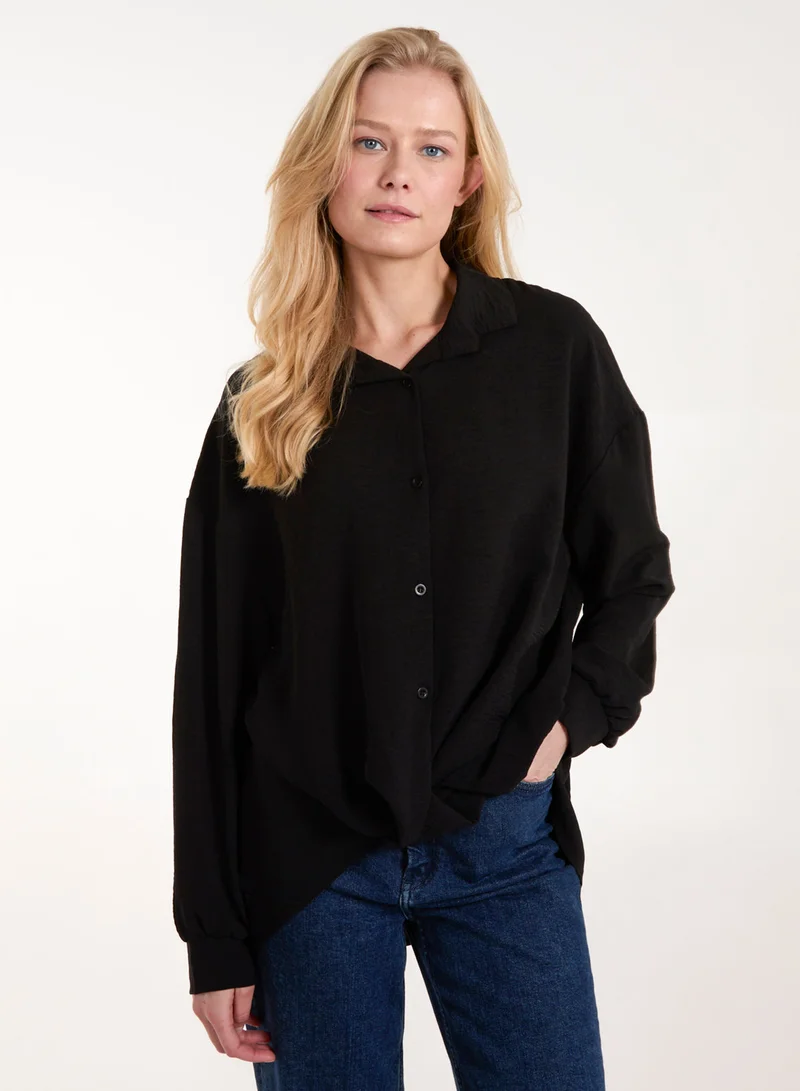 بلو فانيلا قميص بياقة ملتفة