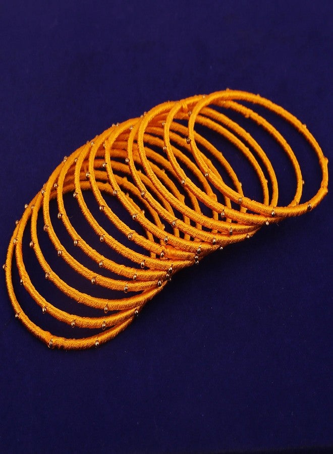 Touchstone "Silk Thread Bangle Collection" Indian Bollywood Handcrafted Faux Silk Thread with Golden Beads Exotic Look Fire Yellow Designer Bangle Bracelets Set of 12 For Women - Image 3