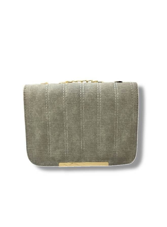 A grey imported leather crossbody bag with elegant details and practical compartments. - Image 3