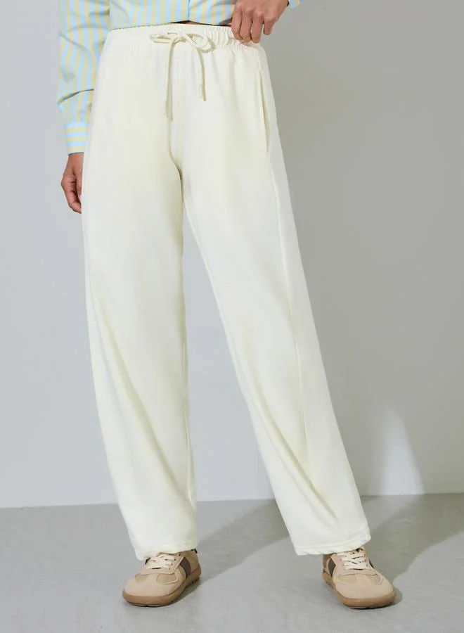 Styli Cream Solid Pintuck Detail Mid-Rise Drawstring Joggers