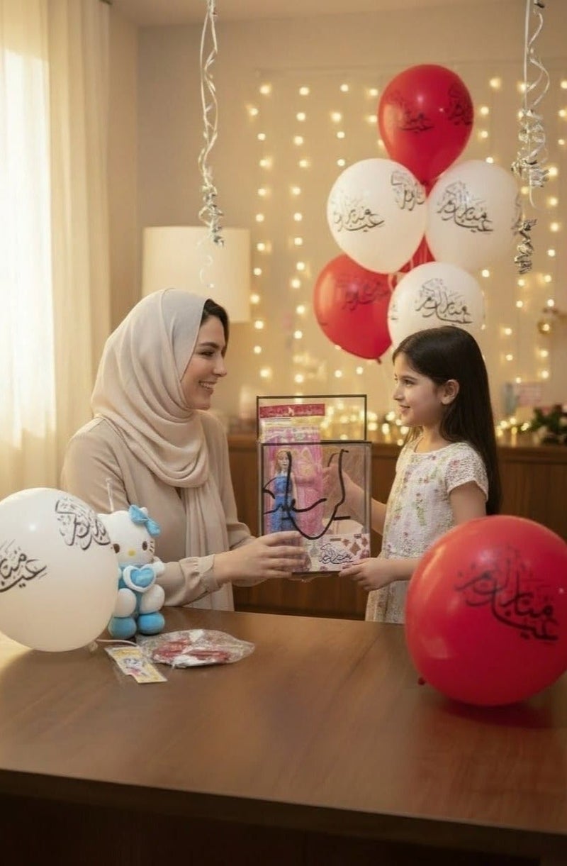 كريتر  صندوق هدايا متكامل للفتيات بعبارة عيد سعيد - مجموعة كاملة للاحتفال بالعيد مكون من لعبة دمية هالوكيتي، لعبة عروسة فتيات مع ملحقاتها (شنطة ولبس بديل وحذاء) ،إكسسوارات أطفال ممتعة (ساعة، نظارة، ربطة شعر ، فيونكه باللون الوردي)، بطاقة تهنئة بالعيد على شكل ايفون برو ماكس 17 ، مجموعة من البالونات برسومات العيد (عساكم من عواده) - Image 3