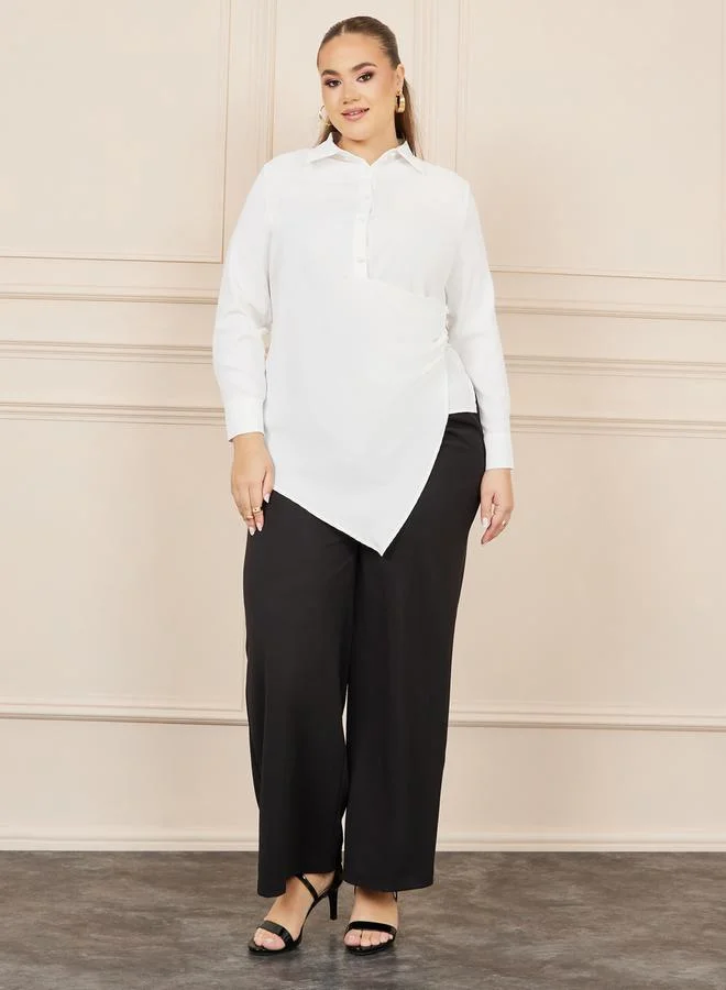 ستايلي Plus Asymmetric Hem Wrap Button Closure Collared Top