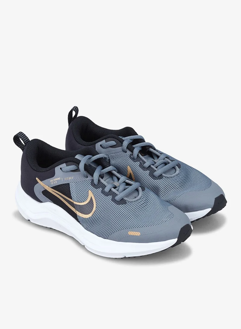 نايكي حذاء الجري داونشيفتر 12 للاطفال الكبار