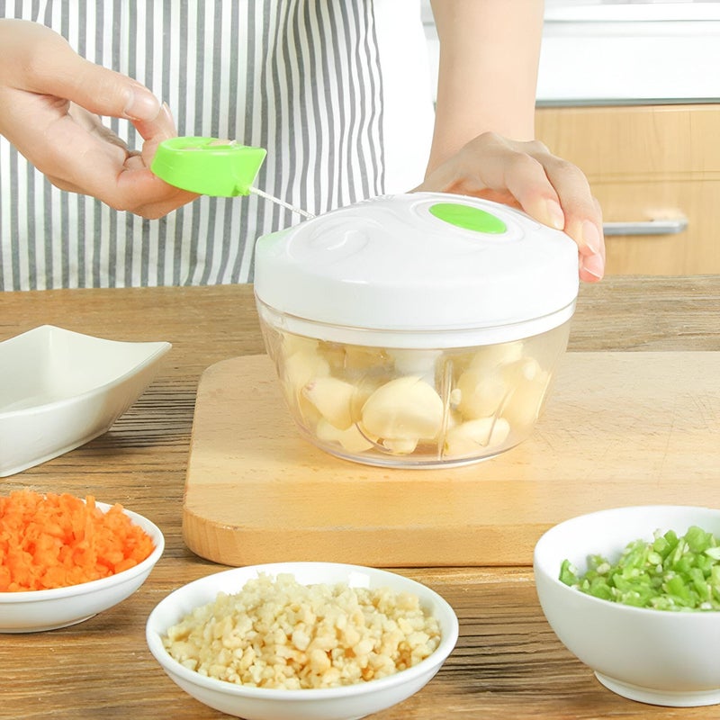 Manual Chopper - Efficient hand-powered food cutter and vegetable grinder with colorful interlocking blades, quick-pull operation, curved stainless steel blades, removable parts, and a non-slip base f - Image 2