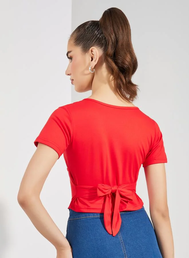 تايك تو Solid Wrap Front Crop Top